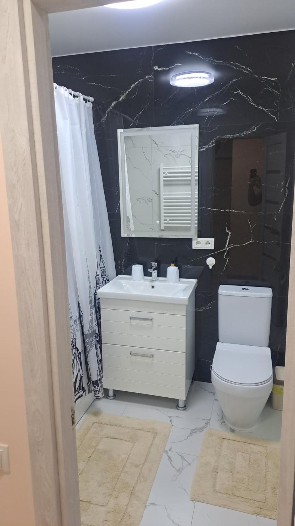 Аэропорт Апартаменты 24&24 Chişinǎu Kamer foto